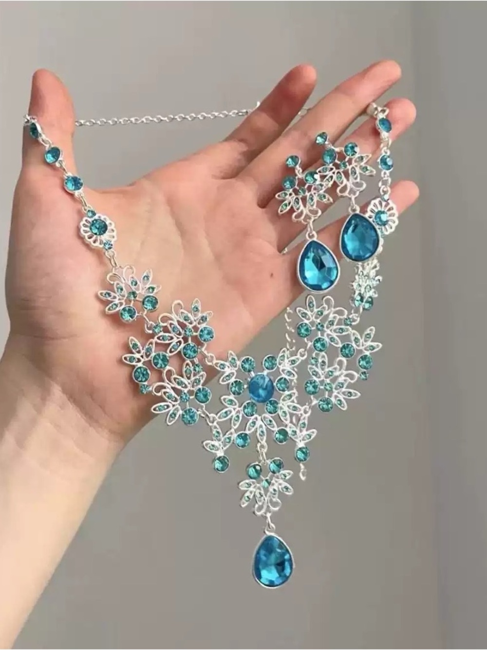 Silver Floral Filigree Necklace with Blue Gemstones